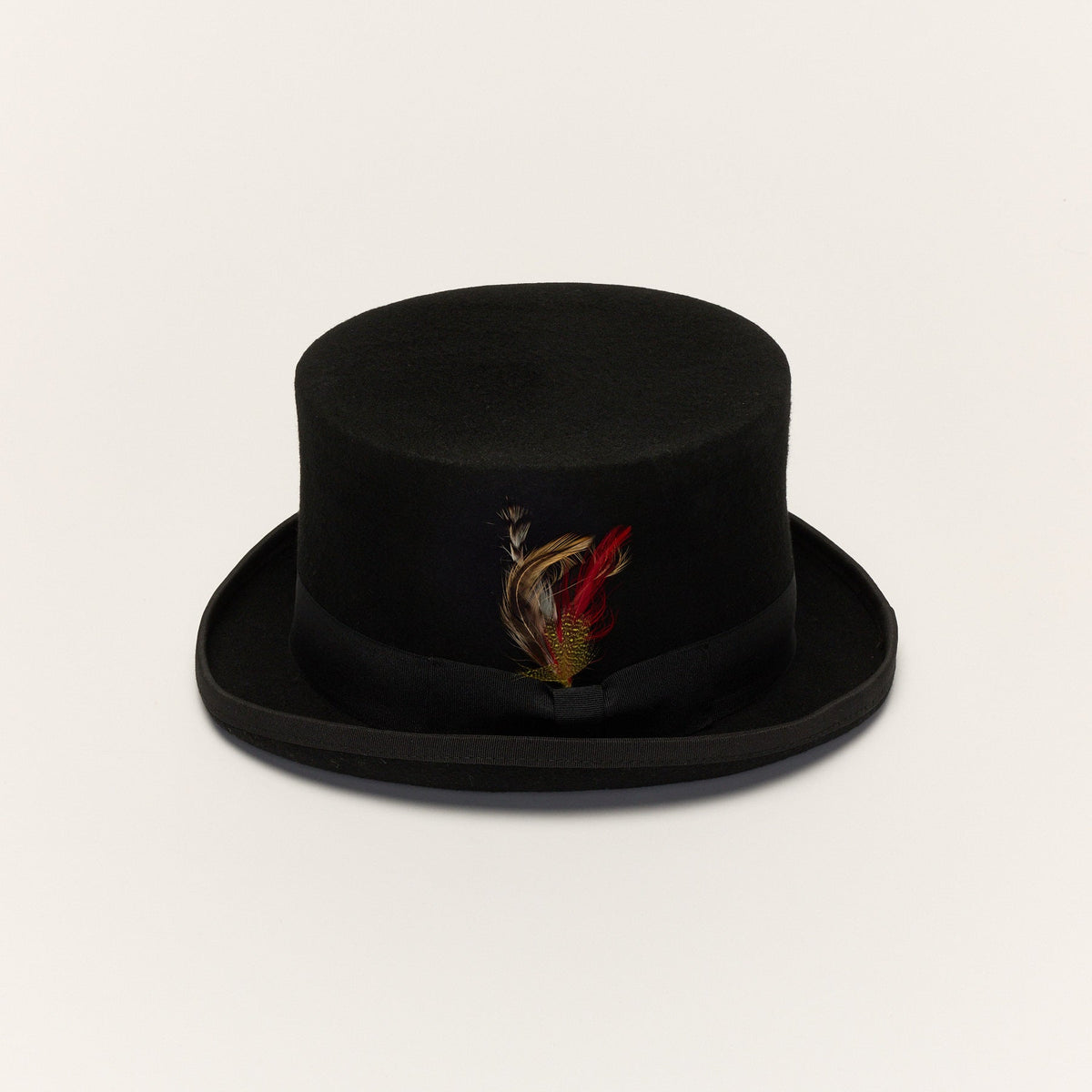 Carriston black wool felt top hat front view with grosgrain ribbon and feather